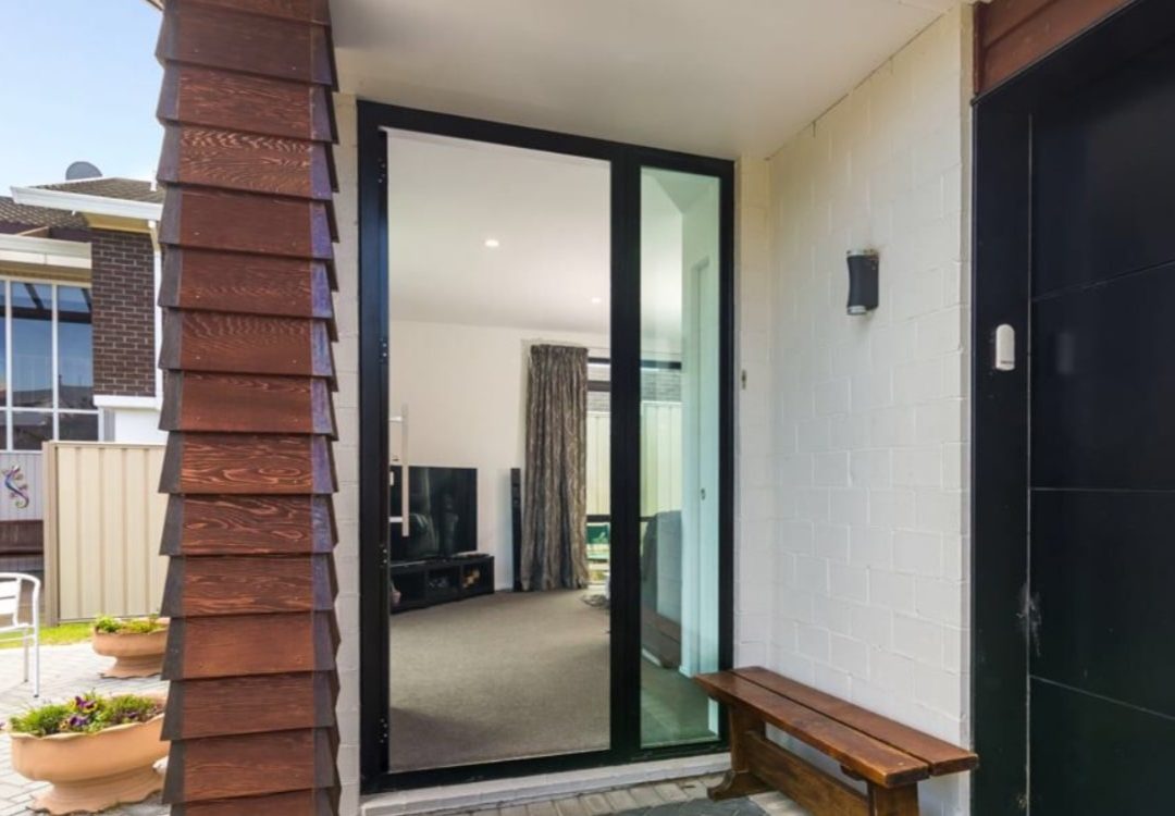 Modern apartment entranceway renovation by Deluxe Homes.
