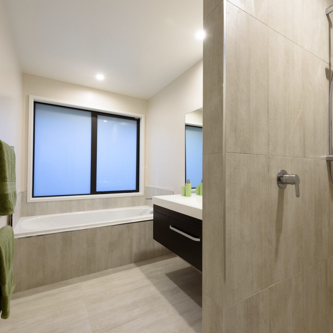 New home shower built by Deluxe Homes.