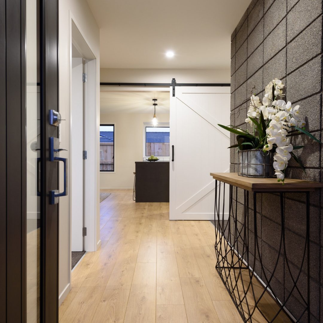 New home build with wide entrance hallway, Deluxe Homes.