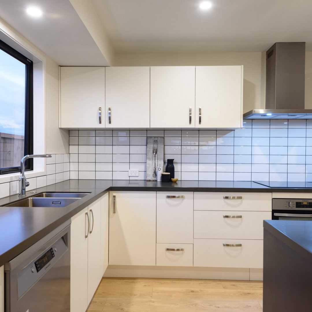Subway tiles in the new kitchen install by Deluxe Homes, Papamoa.