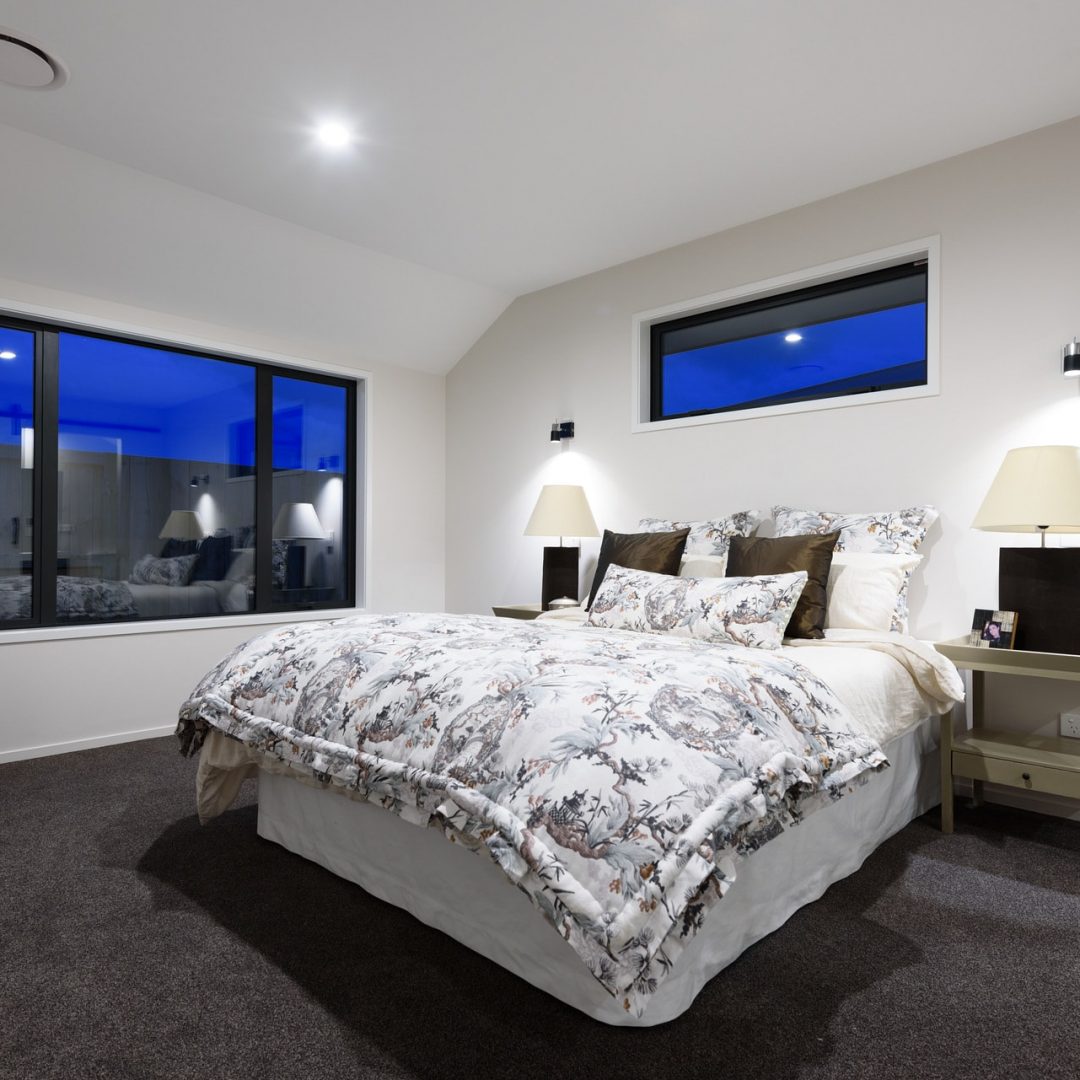 New home bedroom designed and built by Deluxe Homes.