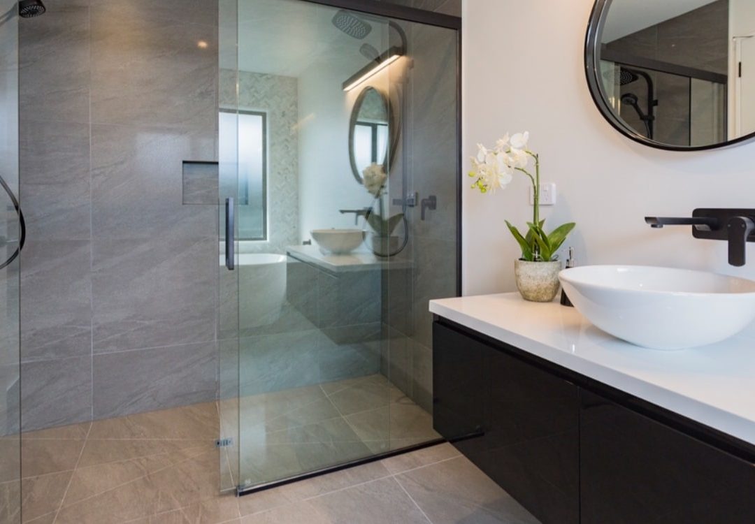 Recent bathroom renovations by Deluxe Homes.